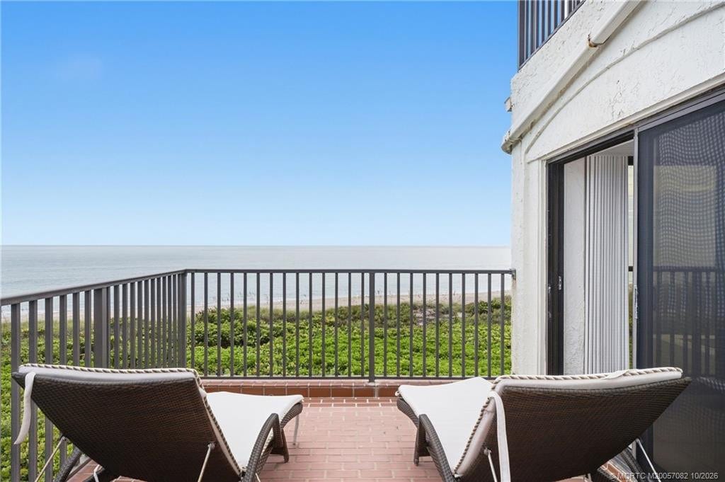 Private oceanfront terrace with front-row views of the Atlantic and plenty of space to relax by the water.