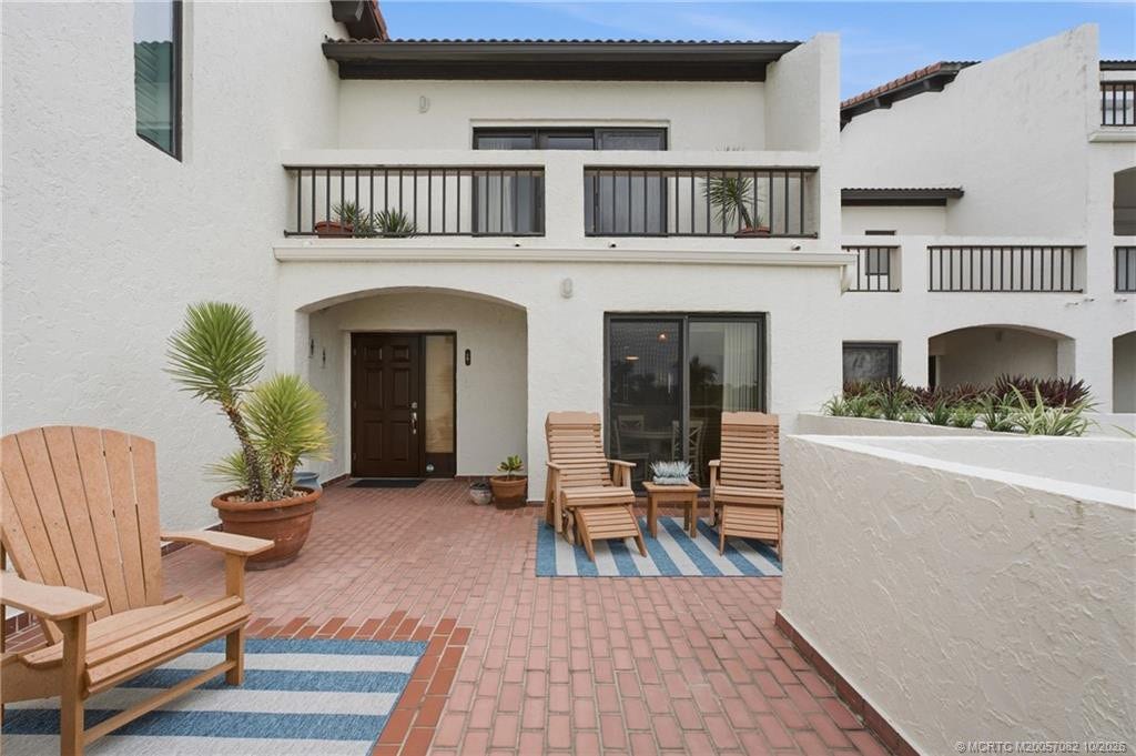 Expansive brick courtyard offers plenty of room for outdoor seating, entertaining and relaxing.
