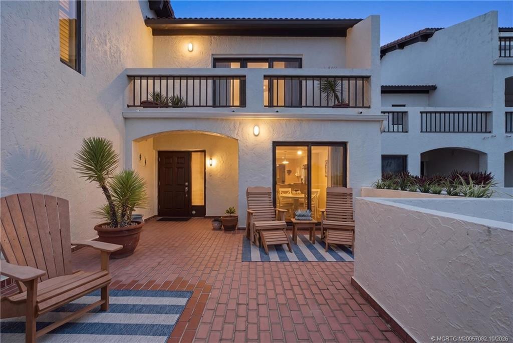 Spacious private courtyard creates an inviting outdoor living area and a beautiful entrance to the residence.