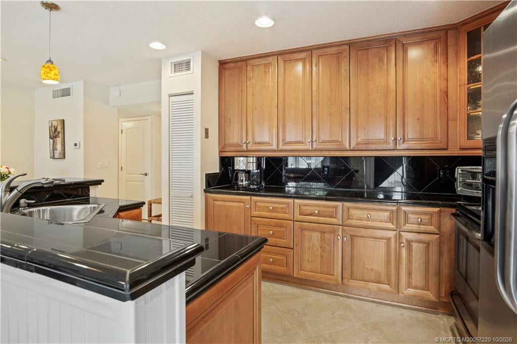 1800 SE Saint Lucie Boulevard, #9-105, Stuart, FL 34996 Under cabinet lighting throughout