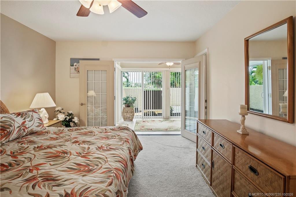 1800 SE Saint Lucie Boulevard, #9-105, Stuart, FL 34996 French doors lead out to lanai