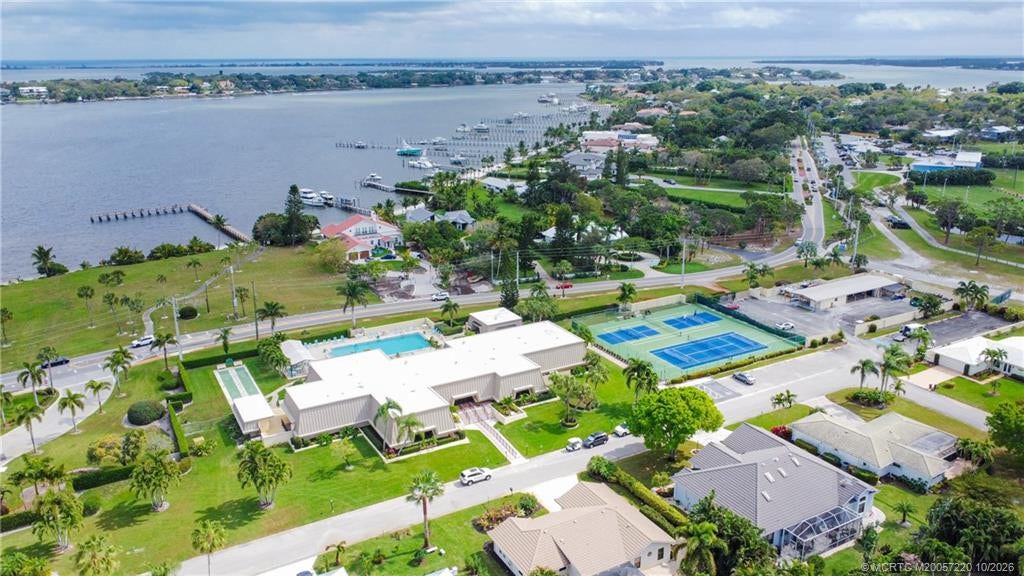 1800 SE Saint Lucie Boulevard, #9-105, Stuart, FL 34996 Aerial view of clubhouse and entrance across from the St. Lucie River