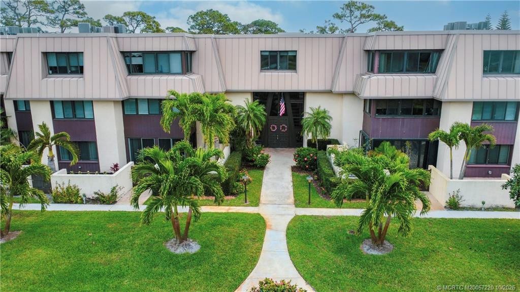 1800 SE Saint Lucie Boulevard, #9-105, Stuart, FL 34996 Bldg 9 entrance with condo on left