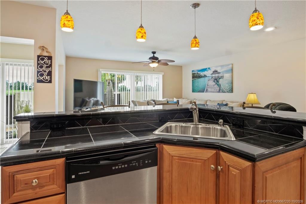 1800 SE Saint Lucie Boulevard, #9-105, Stuart, FL 34996 Only unit with island facing L/R and sink, dishwasher and electric included