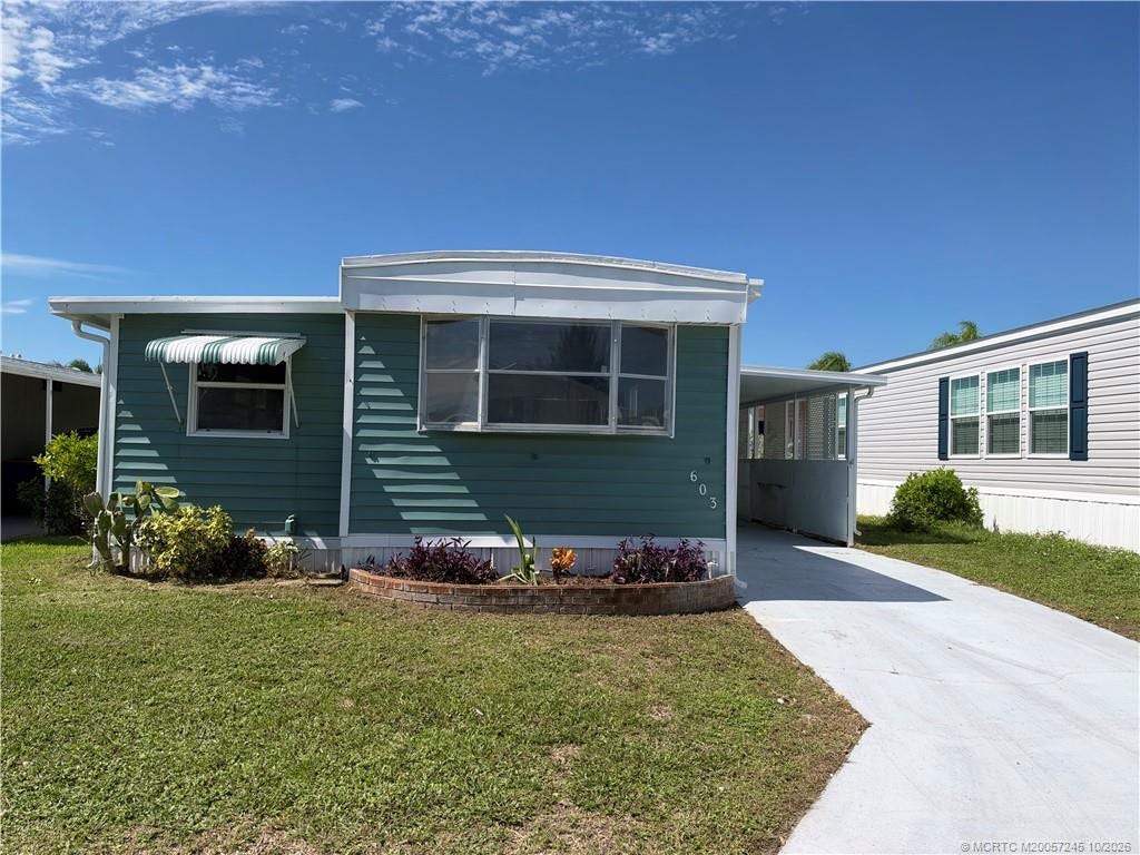 603 Tahiti Way NE, Jensen Beach, FL 34957 Photo 1