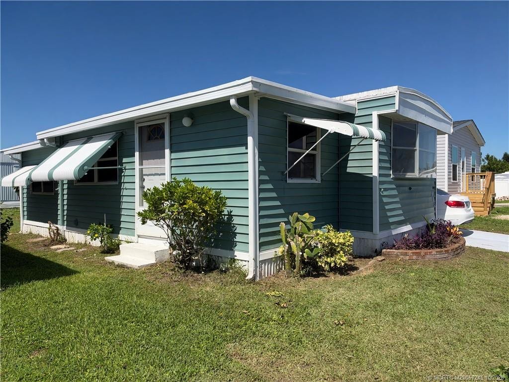 603 Tahiti Way NE, Jensen Beach, FL 34957 Photo 2