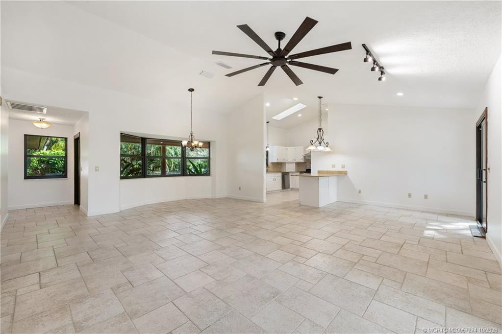 5820 SW Grove Street, Palm City, FL 34990 Great room view to kitchen.