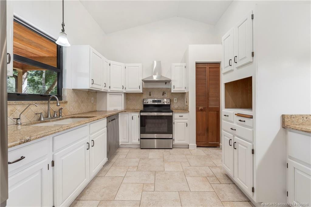 5820 SW Grove Street, Palm City, FL 34990 Kitchen has skylight for natural light.