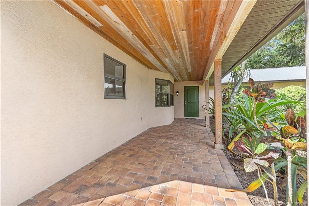 5820 SW Grove Street, Palm City, FL 34990 Entry porch with tongue & groove ceiling.