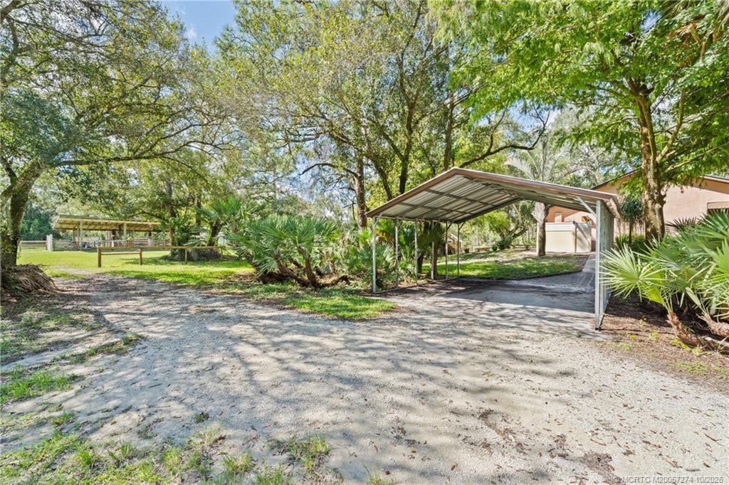 5820 SW Grove Street, Palm City, FL 34990 carport.