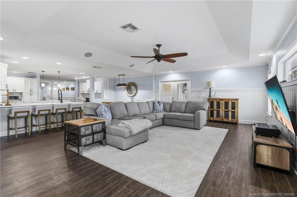 2657 SW Harem Circle, Port St Lucie, FL 34953 Spacious family room offers comfortable gathering space and an effortless connection to the kitchen and dining areas.