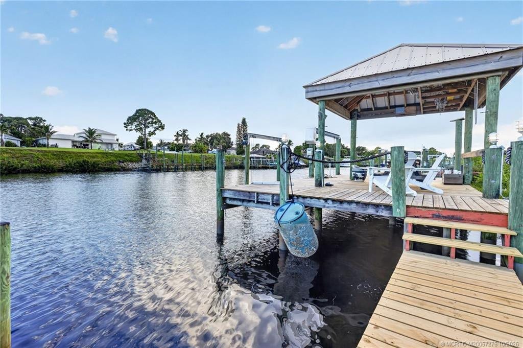 2657 SW Harem Circle, Port St Lucie, FL 34953 New decking installed in 2026 on the boat dock and steps