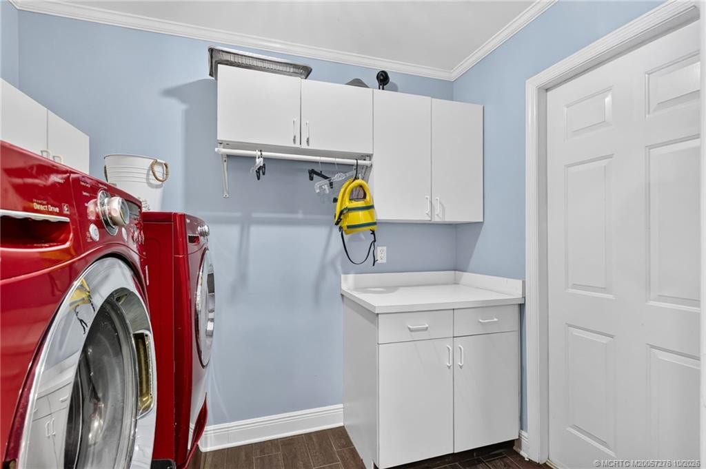 2657 SW Harem Circle, Port St Lucie, FL 34953 Interior laundry room with LG washer and dryer