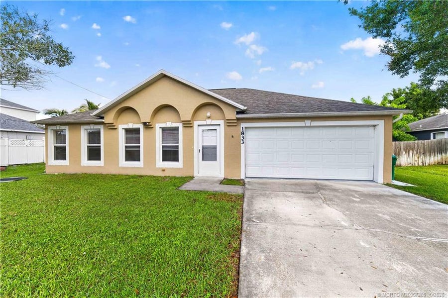Property photo for 1833 SW Lofgren Avenue, Port St Lucie, FL