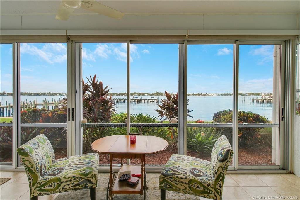 Your front-row seat to paradise! Relax on the enclosed waterfront porch while enjoying spectacular panoramic views of the St. Lucie River, passing boats, and unforgettable Florida sunsets.