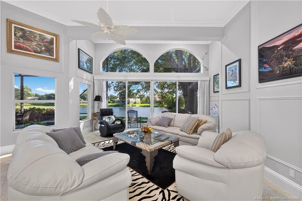 1642 NW Sweet Bay Circle, Palm City, FL 34990 Expanded Living Room with golf & water views.