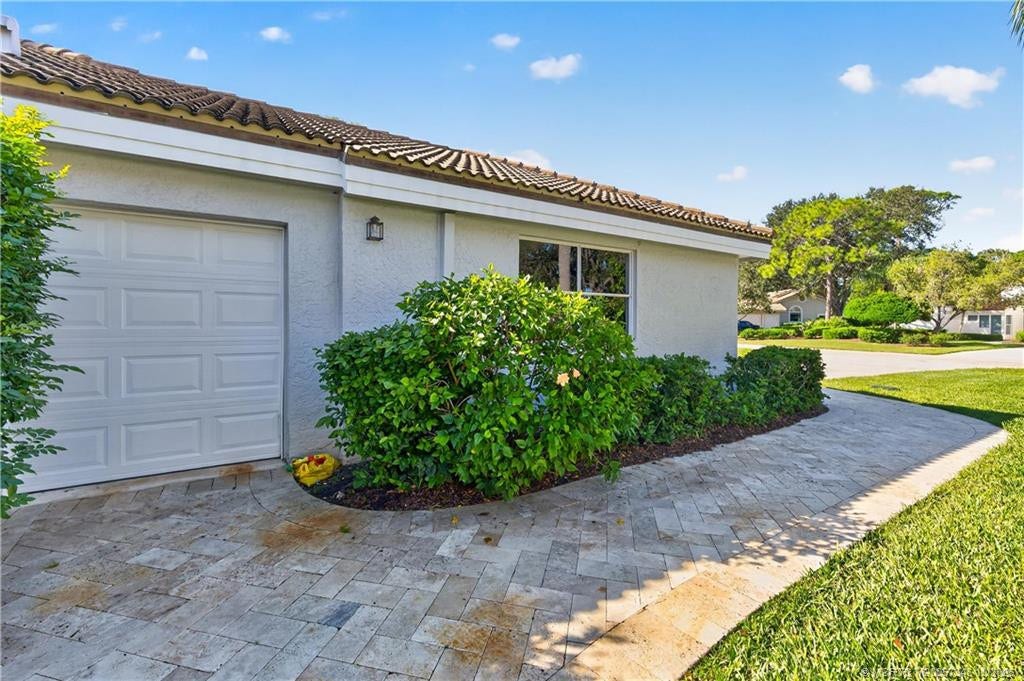 1642 NW Sweet Bay Circle, Palm City, FL 34990 Separate Golf Cart Entry on side of Garage