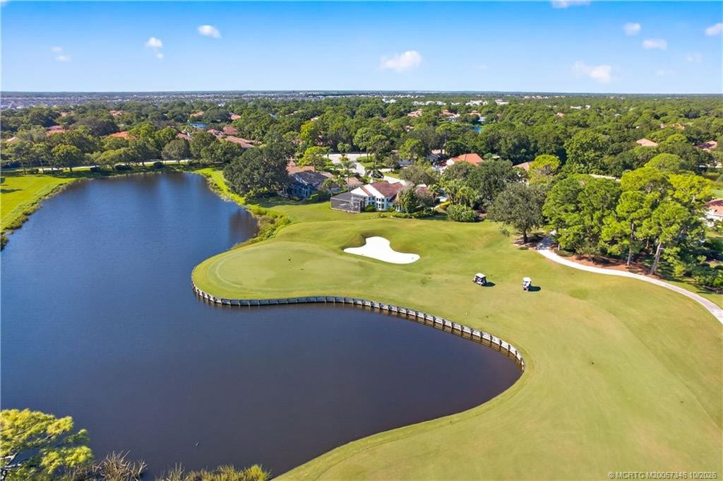 1642 NW Sweet Bay Circle, Palm City, FL 34990 Located on Lake of #11 River Ridge Course