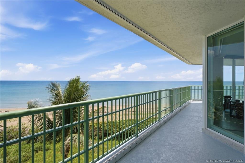 Enjoy panoramic ocean views and refreshing coastal breezes from this spacious private balcony.
