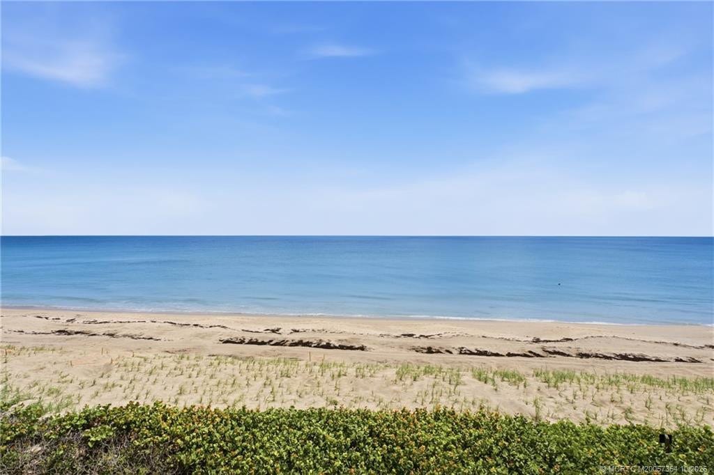 Enjoy breathtaking views of the Atlantic Ocean and pristine sandy beach, with beautiful blue water stretching to the horizon.