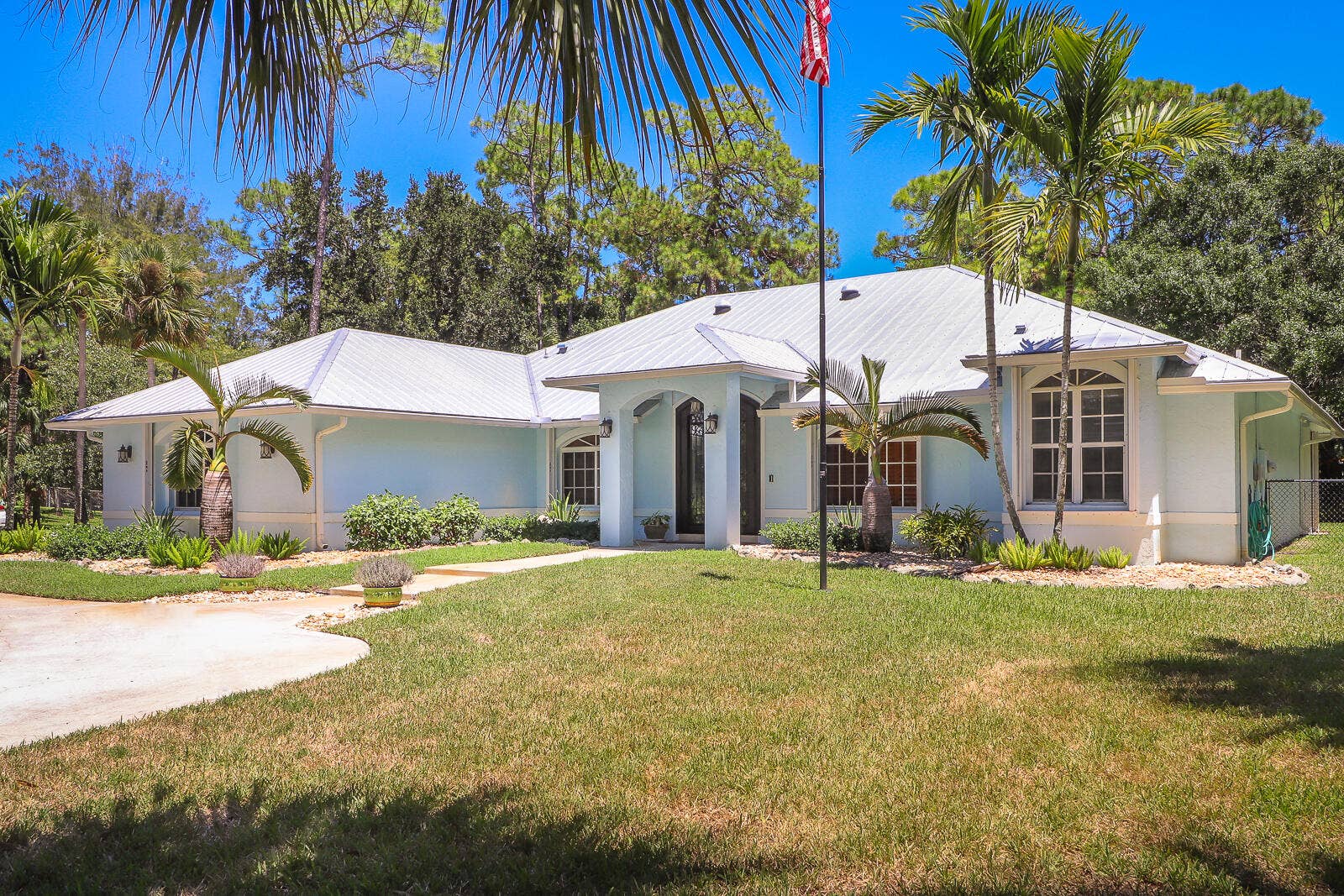 15386 83rd Way N, Palm Beach Gardens, FL 33418 01-Front Exterior