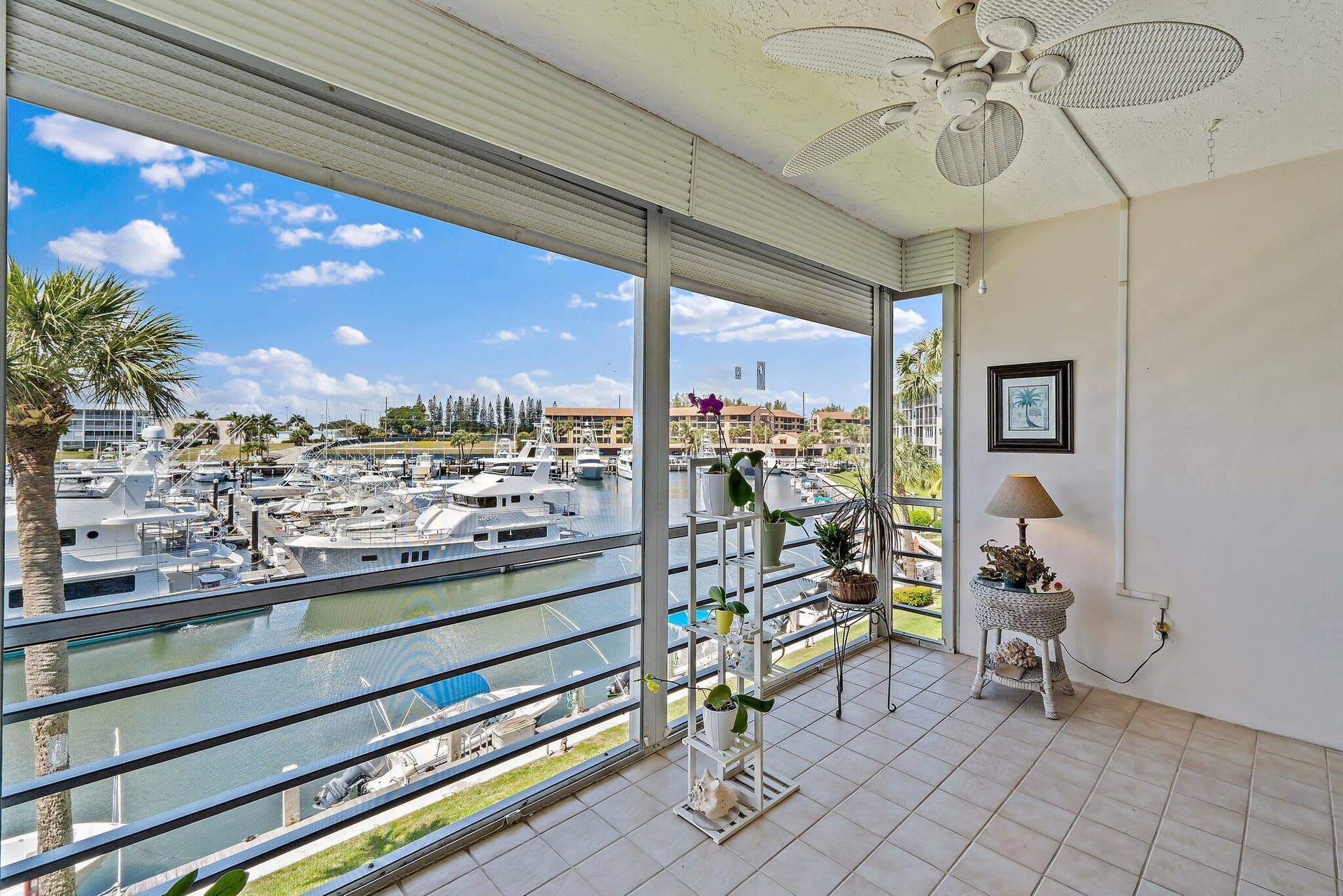 29 Yacht Club Drive, #302-D, North Palm Beach, FL 33408 Screened Patio / Marina View