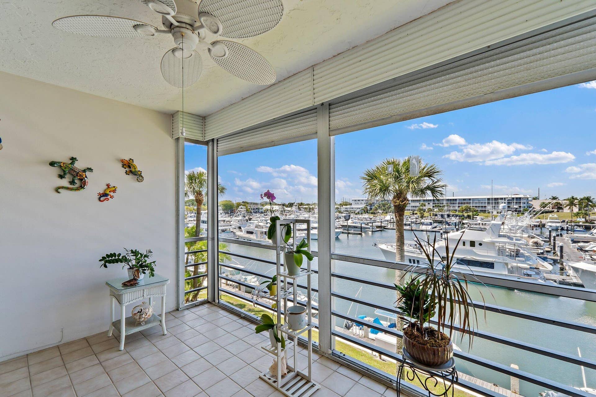 29 Yacht Club Drive, #302-D, North Palm Beach, FL 33408 Screened Patio / Marina View