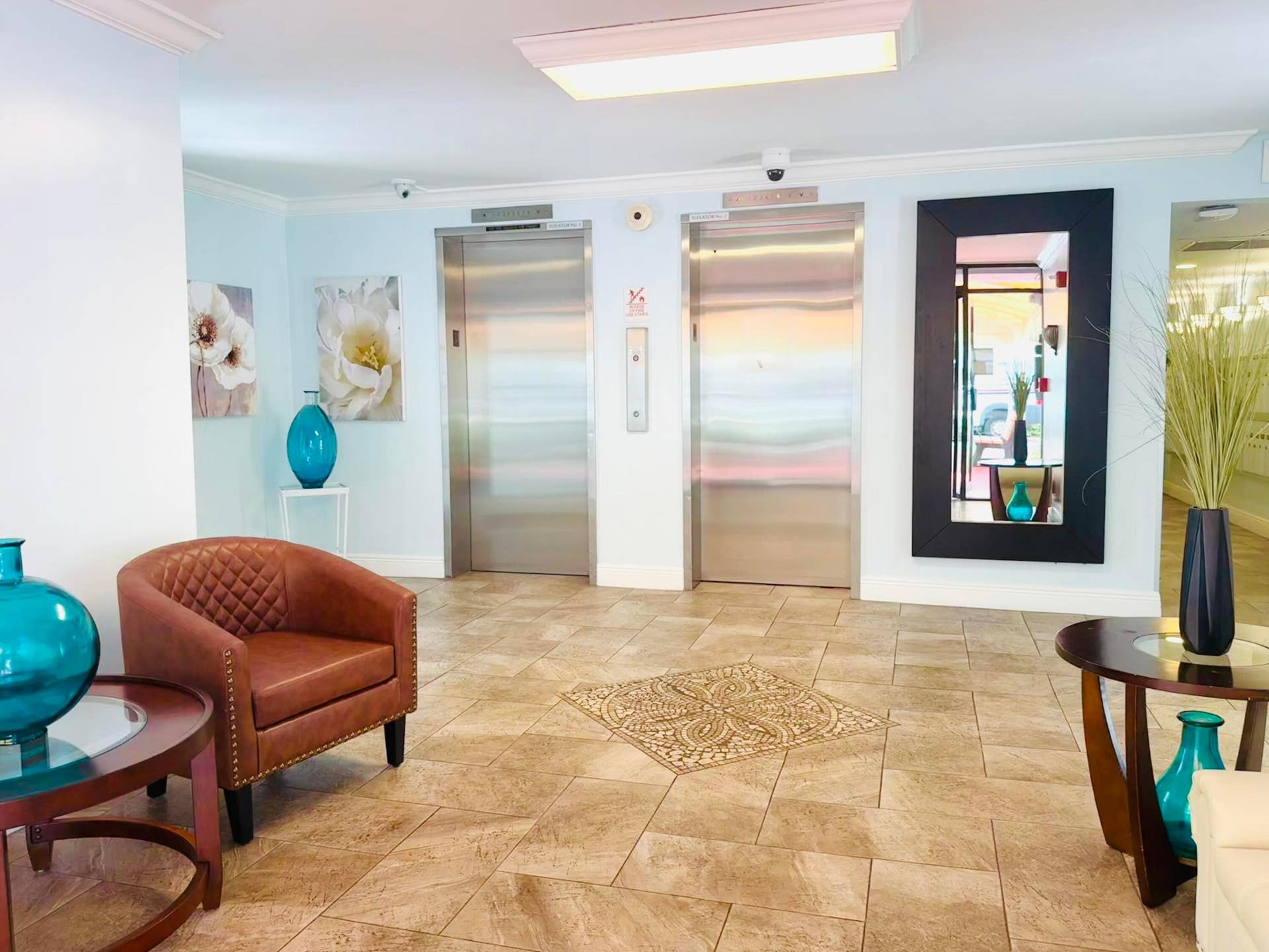 3080 N Course Drive, #202, Pompano Beach, FL 33069 Freshly painted building and lobby. Secure entry. Nighttime patrol security.