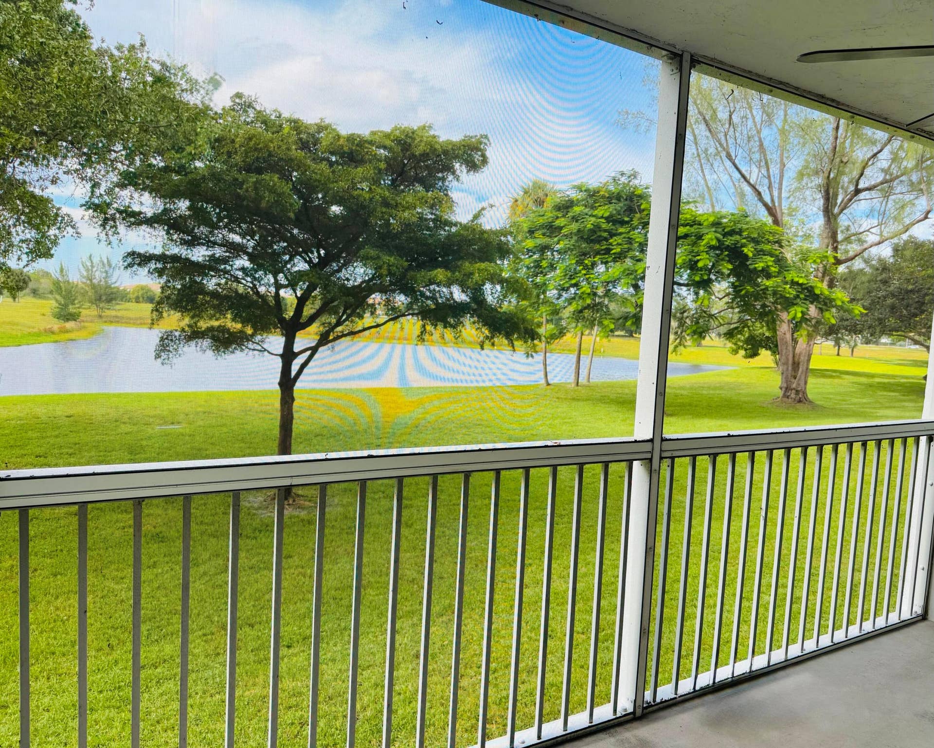 3080 N Course Drive, #202, Pompano Beach, FL 33069 Second floor tree canopy view overlooking the lake