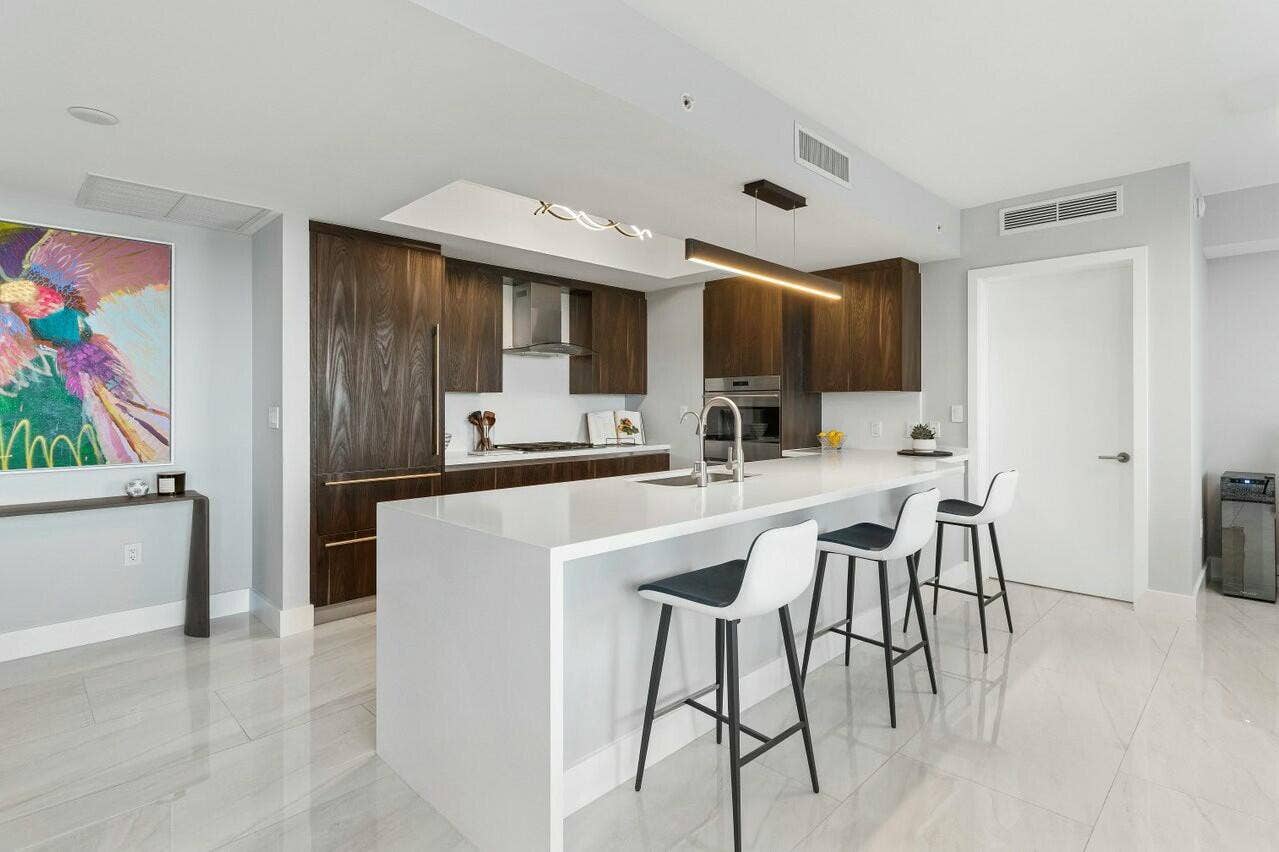 1180 N Federal Highway, #1409, Fort Lauderdale, FL 33304 Wolf gas cooktop and Sub-Zero fridge, Elegant Italian cabinetry, Quartz Countertops