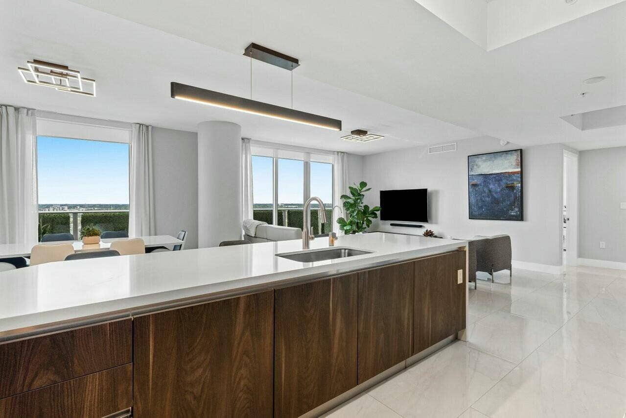 1180 N Federal Highway, #1409, Fort Lauderdale, FL 33304 Wolf gas cooktop and Sub-Zero fridge, Elegant Italian cabinetry, Quartz Countertops, Oversized Porcelain Tile Throughout