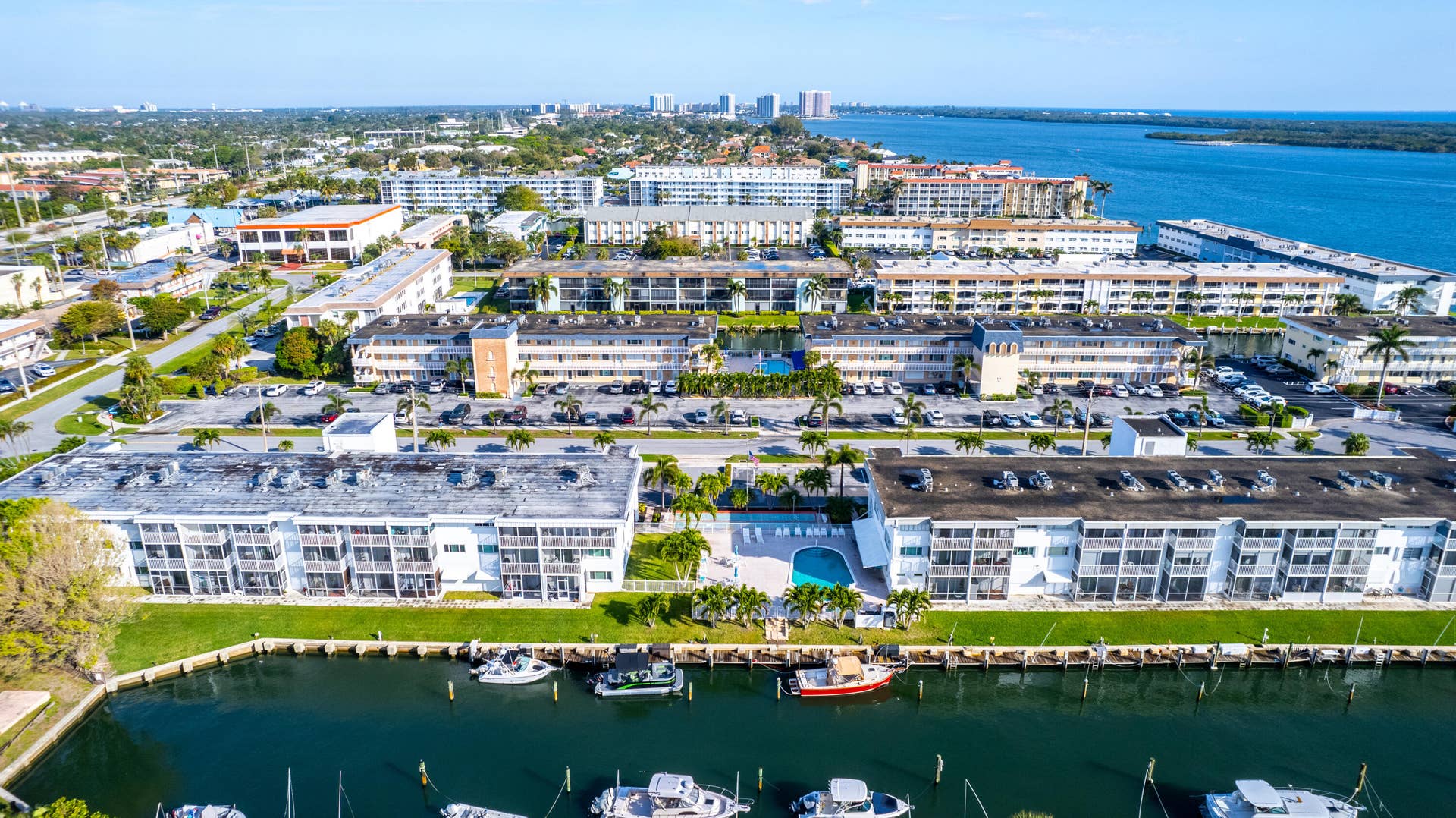 112 Doolen Court, #302, North Palm Beach, FL 33408 Aerial Building & Canal