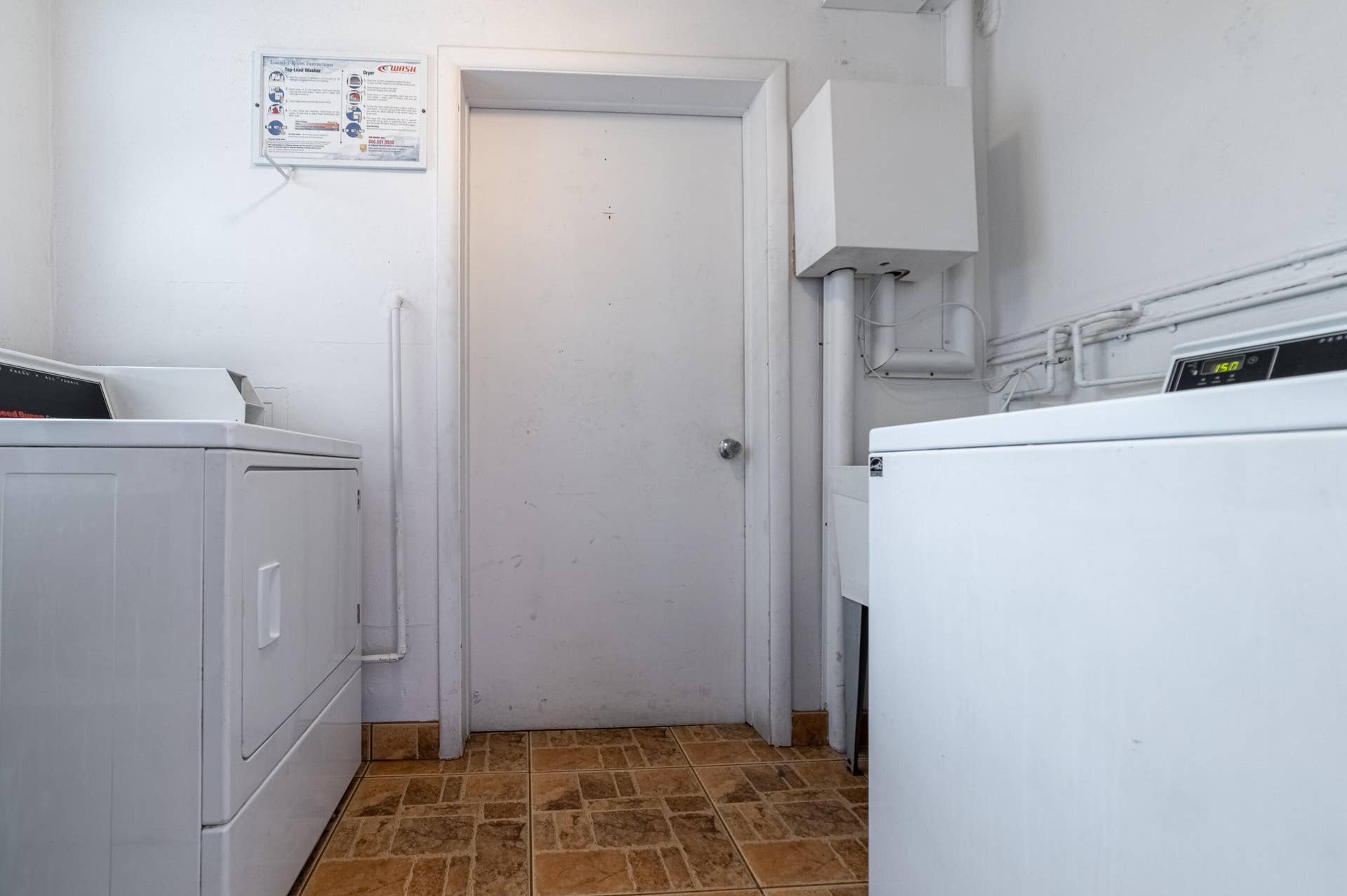 112 Doolen Court, #302, North Palm Beach, FL 33408 3rd Floor Laundry Room