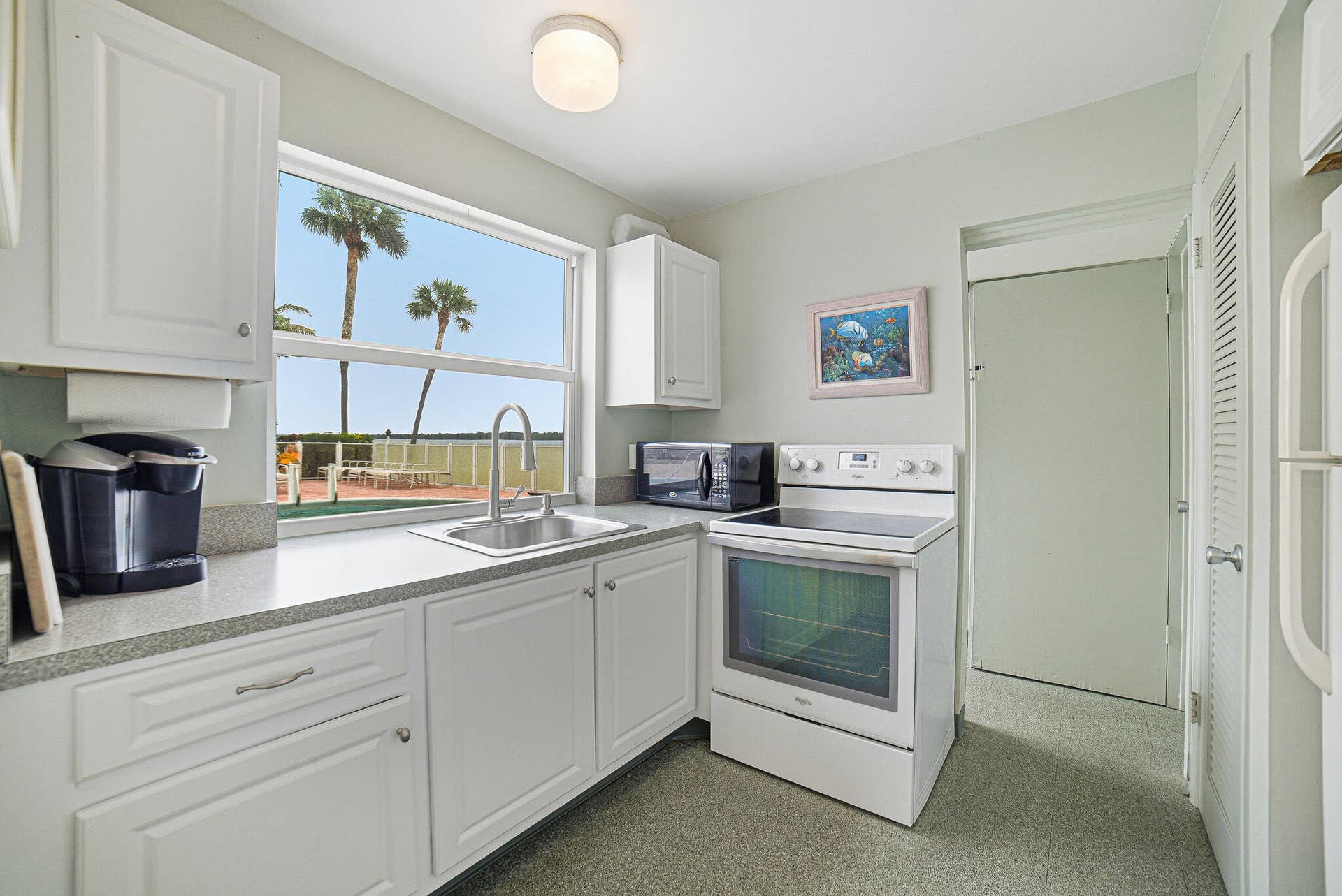 101 Doolen Court, #201, North Palm Beach, FL 33408 Community Room Kitchen