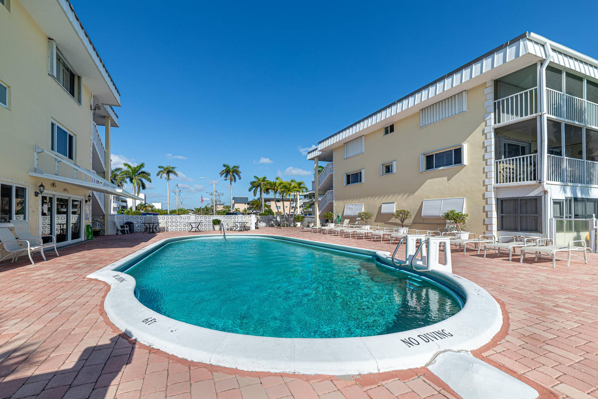 101 Doolen Court, #201, North Palm Beach, FL 33408 Pool Area View West
