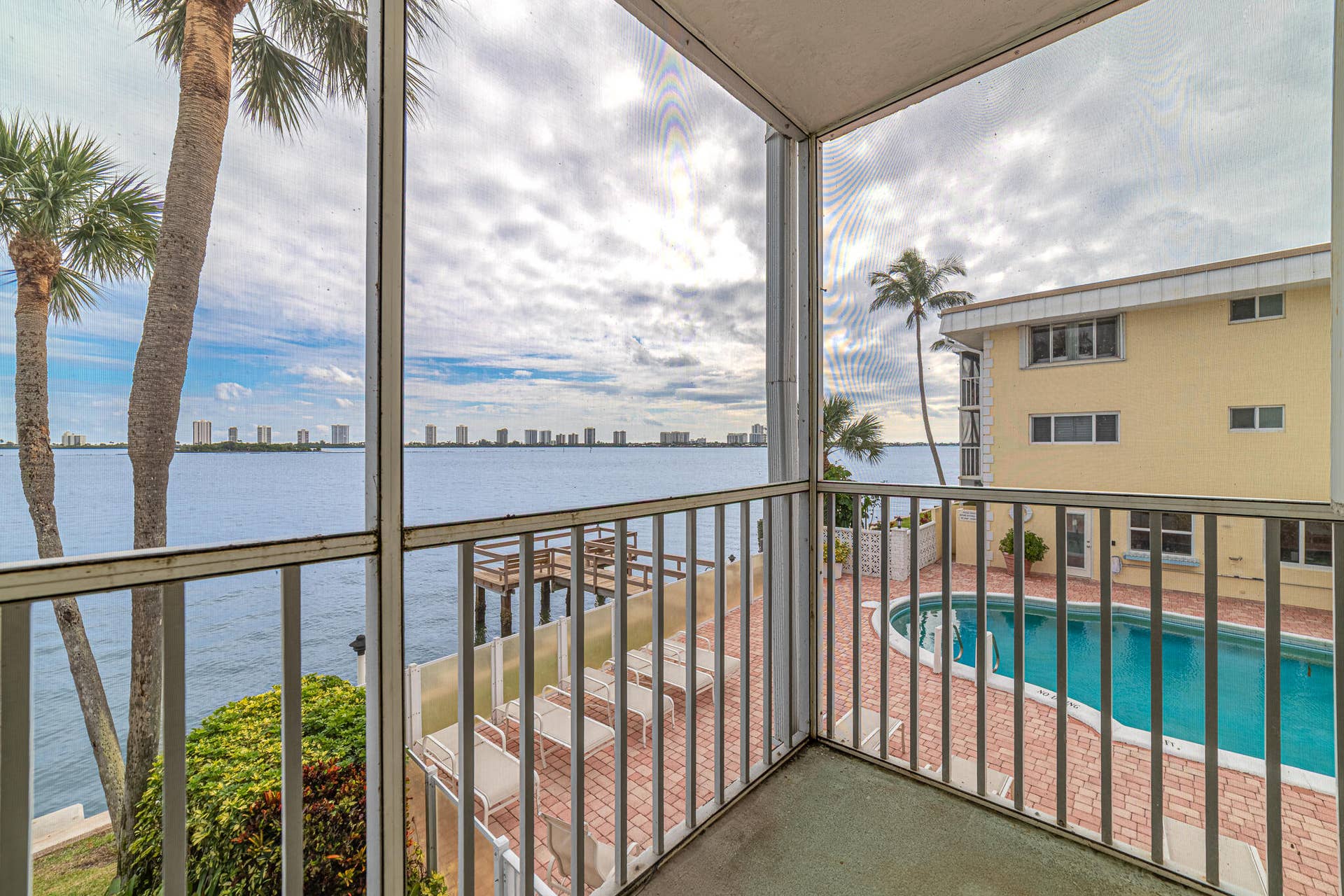 101 Doolen Court, #201, North Palm Beach, FL 33408 Balcony Pool View & Intracoastal