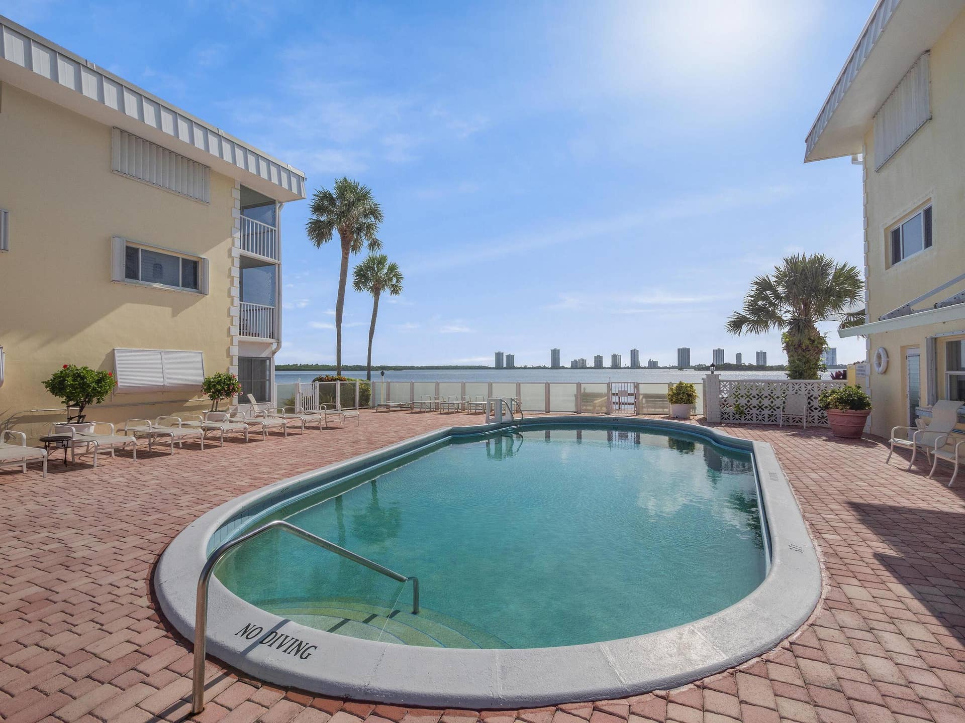 101 Doolen Court, #201, North Palm Beach, FL 33408 Pool Area View East
