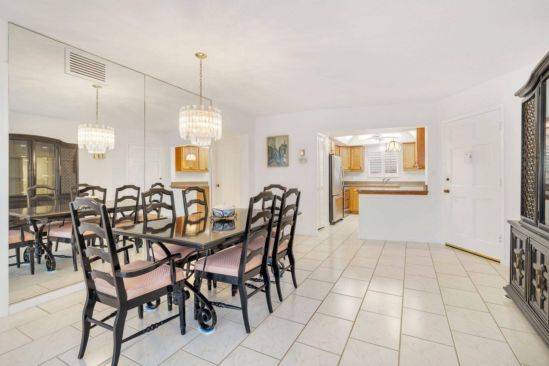 907 Marina Drive, #402, North Palm Beach, FL 33408 dining area open to kit & living area