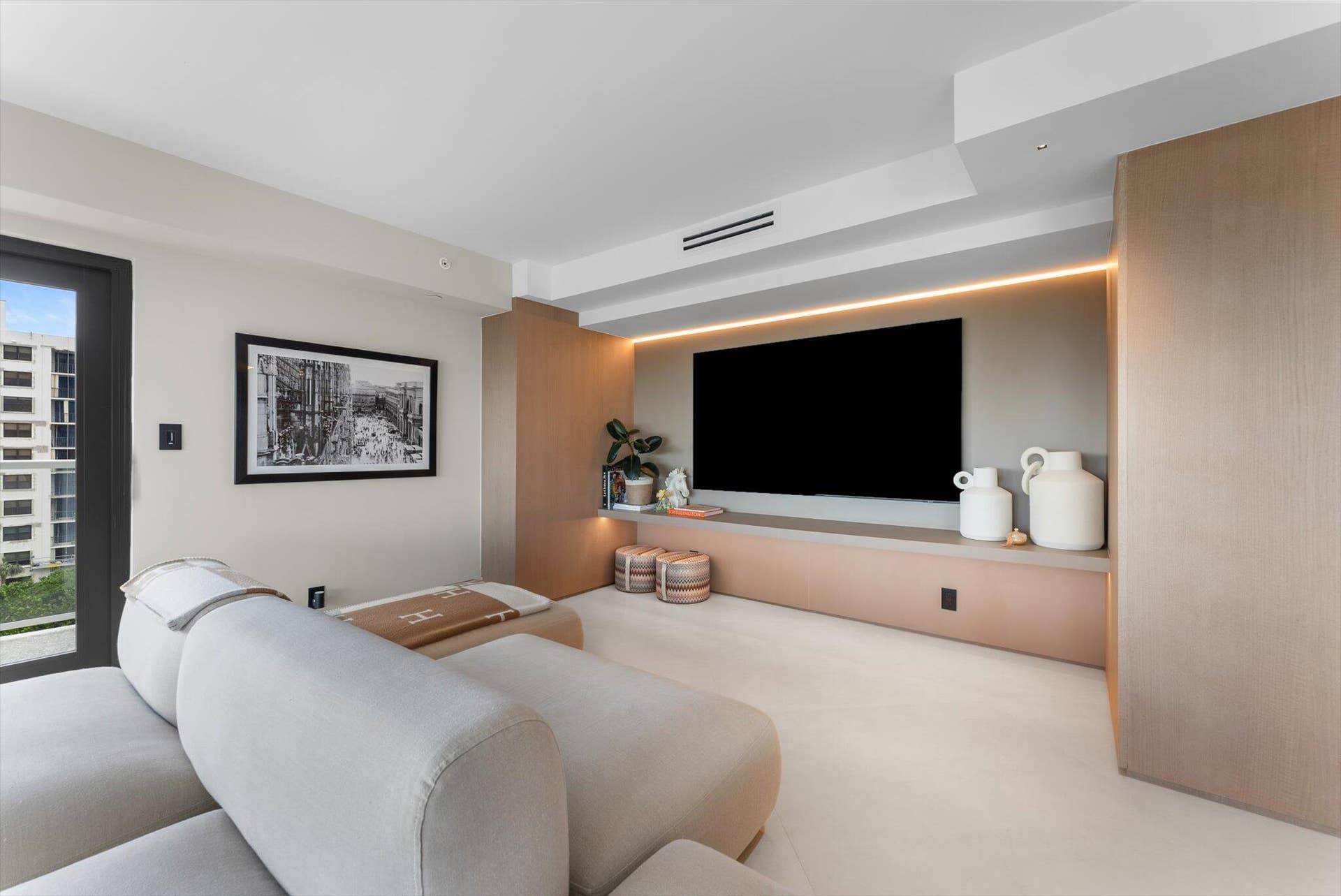 Custom Wood Living and Entertainment Area with LED Lighting