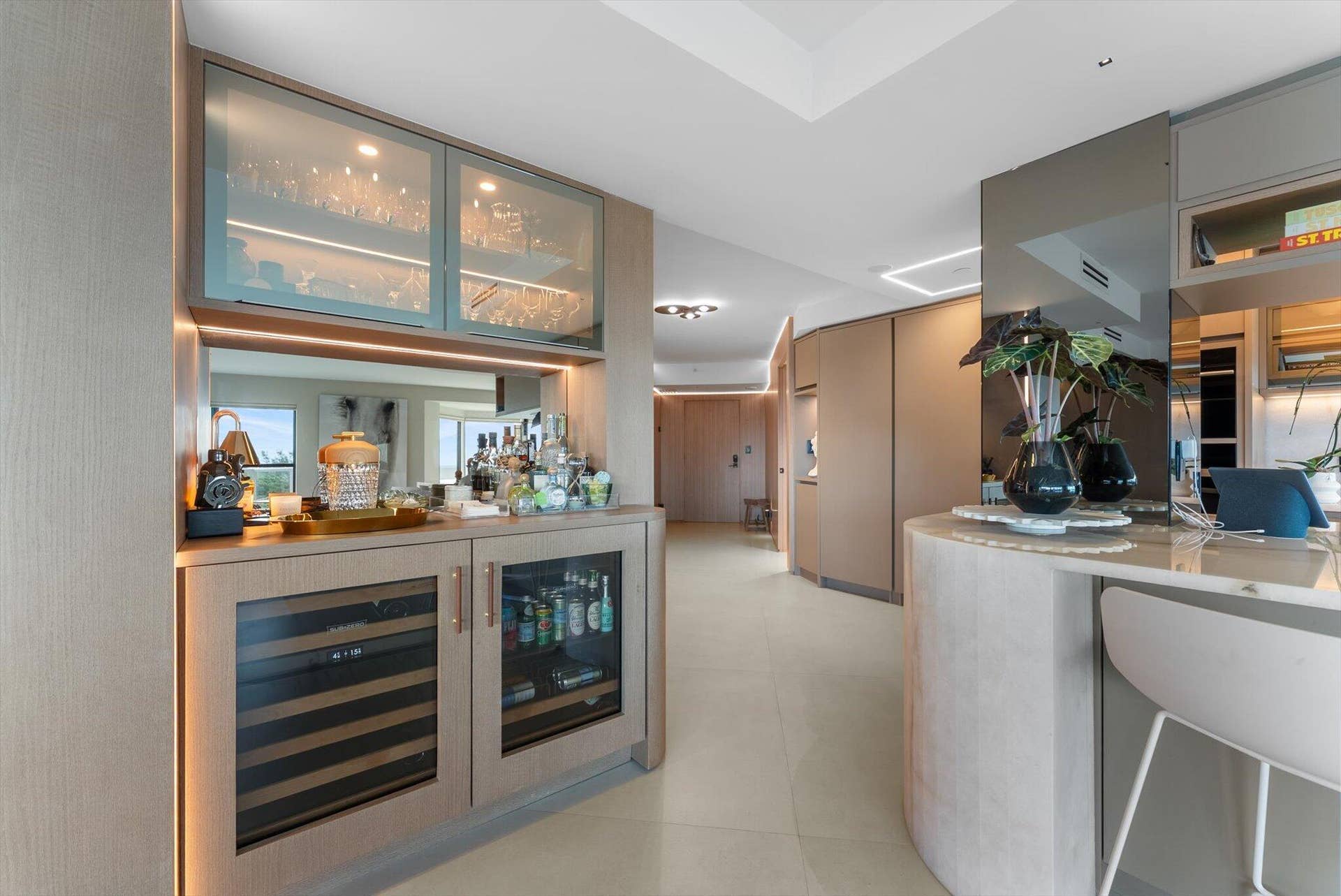 Wet bar with Subzero Wine Refrigerator and Beverage Center