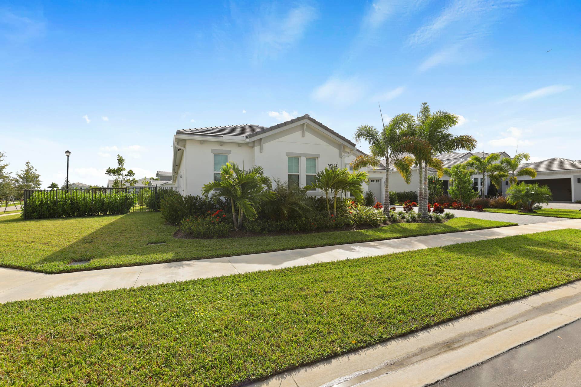 14952 Woodlot Court, Westlake, FL 33470 Beautiful landscaping and corner lot.