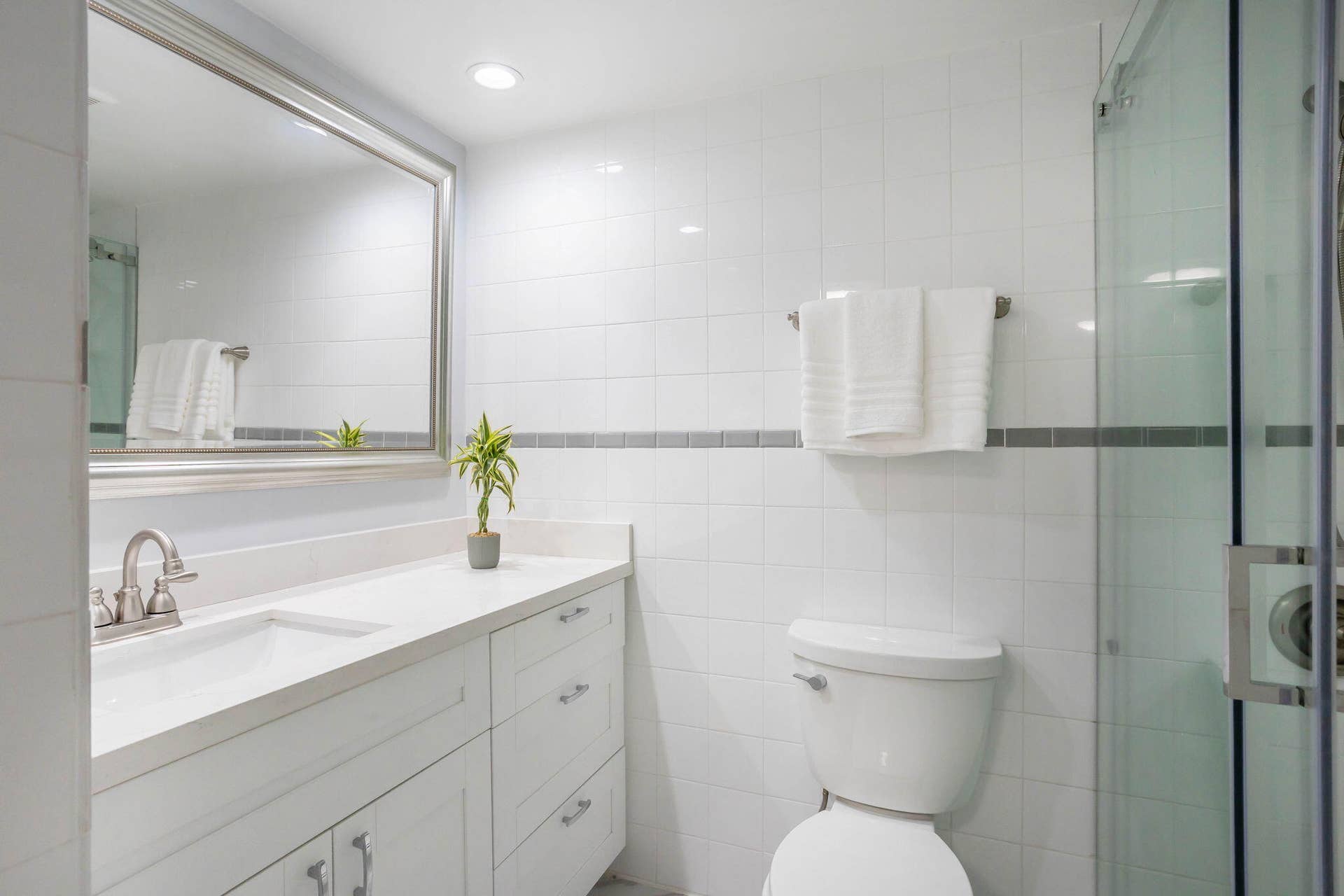 White bright tastefully renovated bathroom