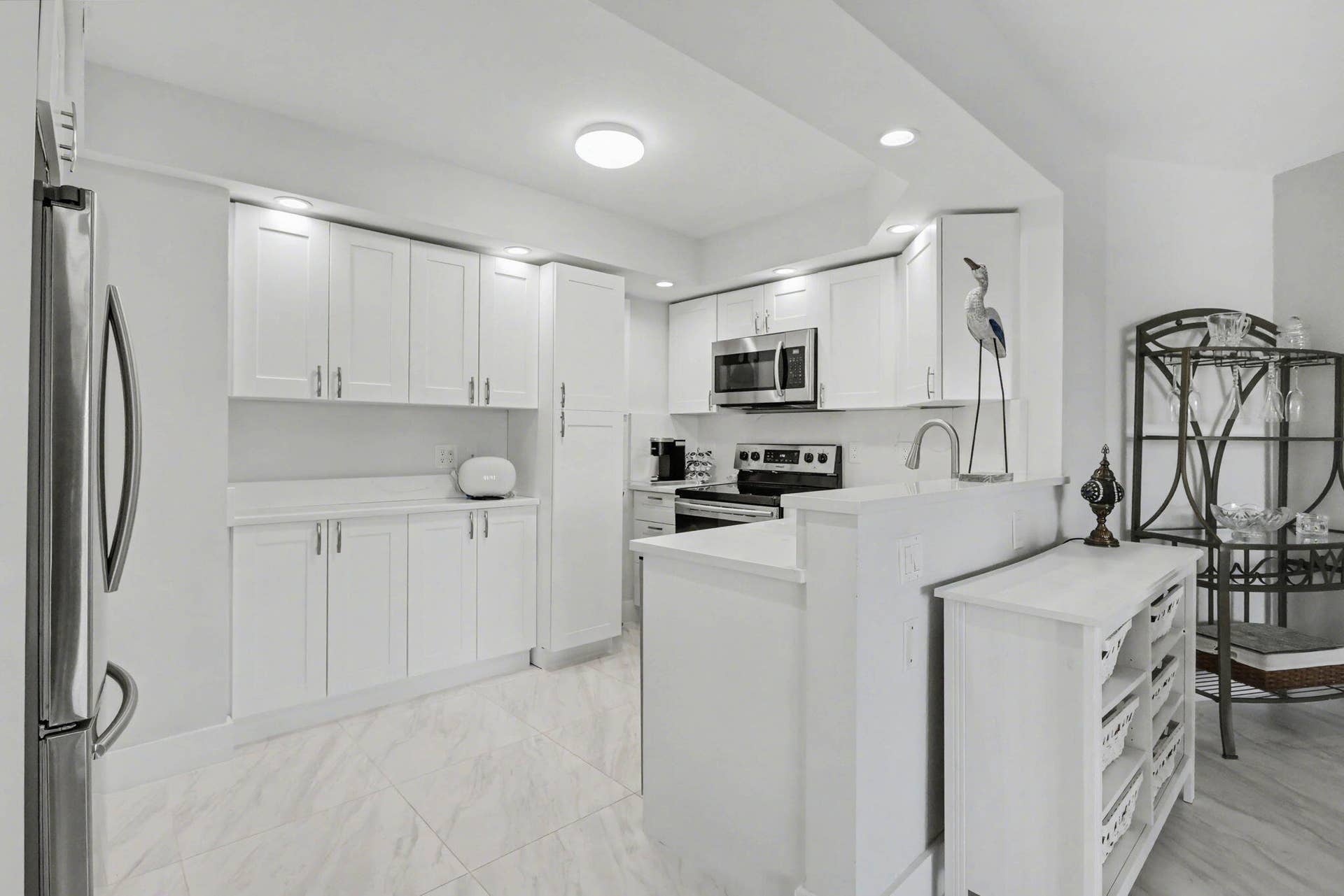 Beautiful fully renovated white and bright open concept kitchen