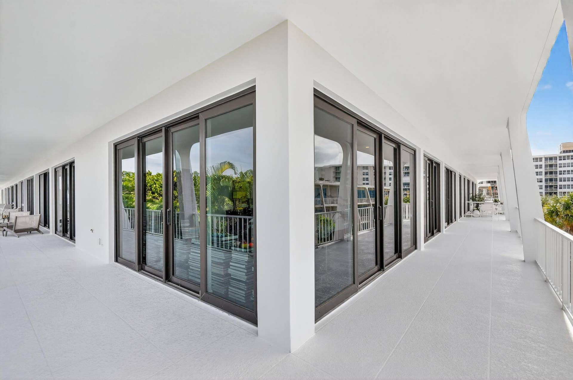 2275 S Ocean Boulevard, #305n and C11, Palm Beach, FL 33480 Corner unit with wrap around balcony with beautiful tropical views of Phipps Park and balcony views of the ocean.