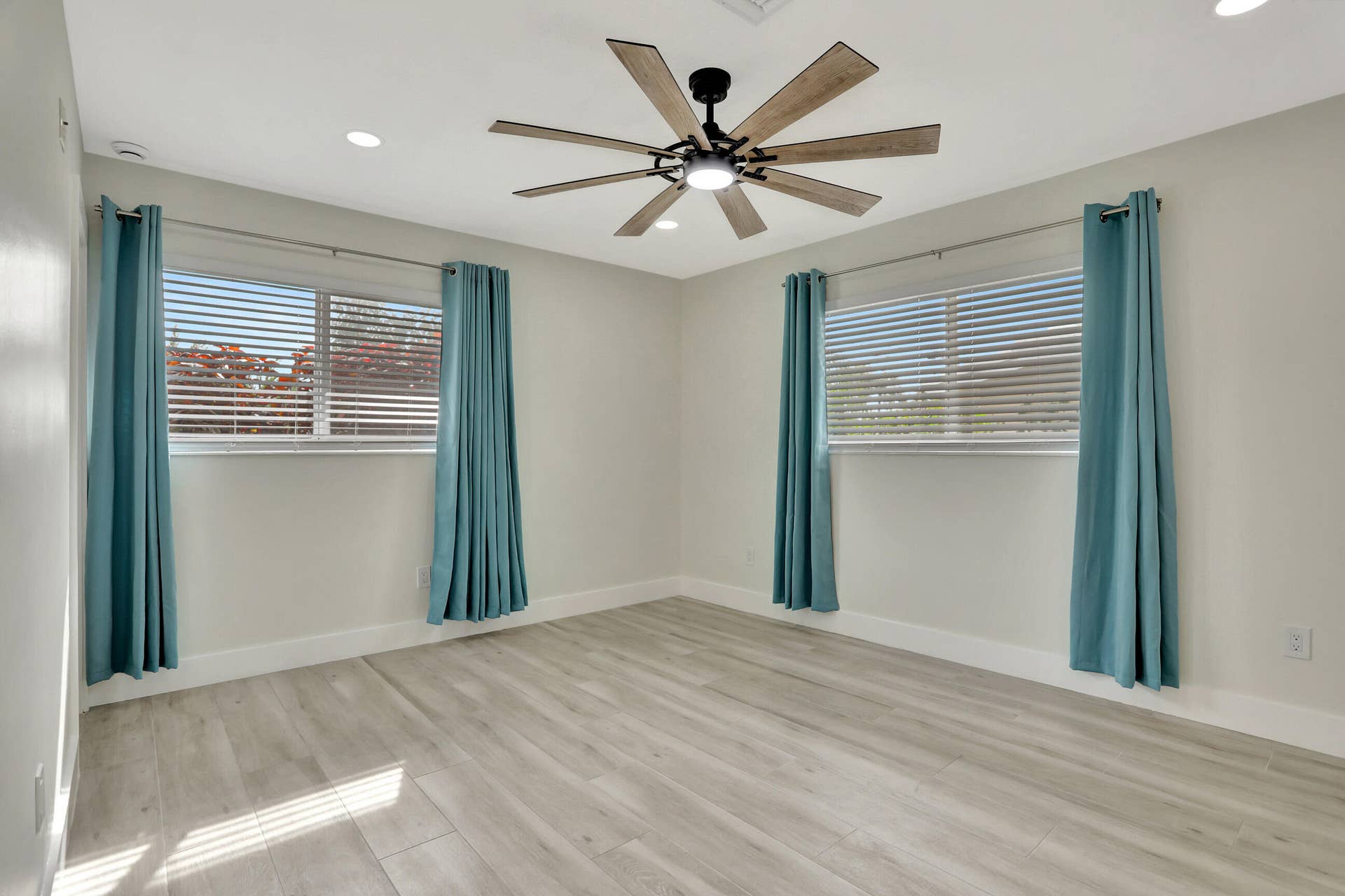 421 SE 5 Terrace, Pompano Beach, FL 33060 Bedroom 2 but can be primary suite. Has a full bathroom inside, storm windows and new large light and fan. High hat lighting.