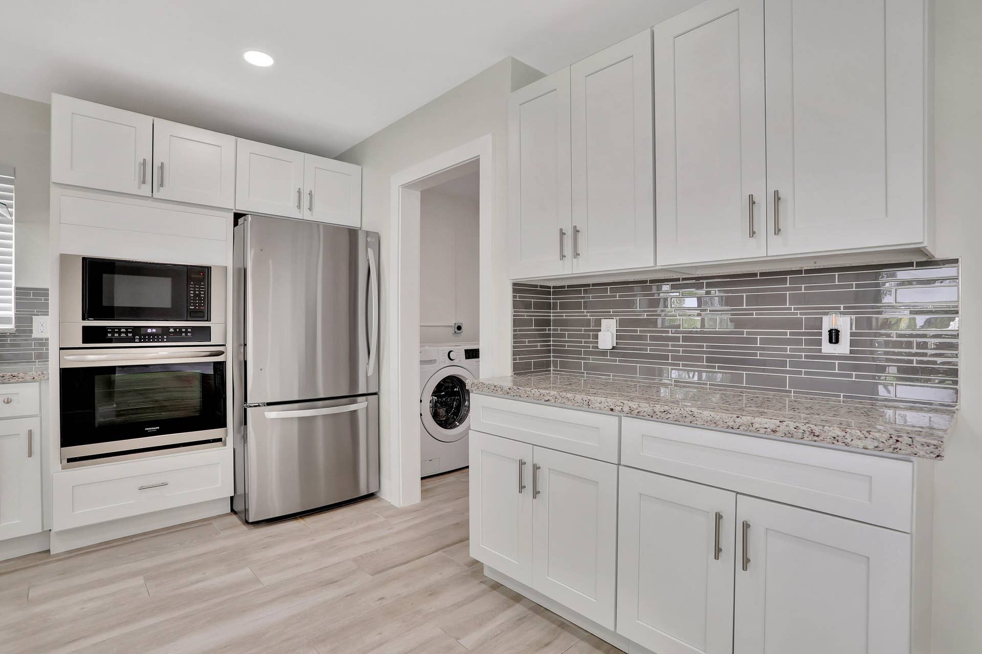 421 SE 5 Terrace, Pompano Beach, FL 33060 Part of kitchen leading to the laundry room and garage.