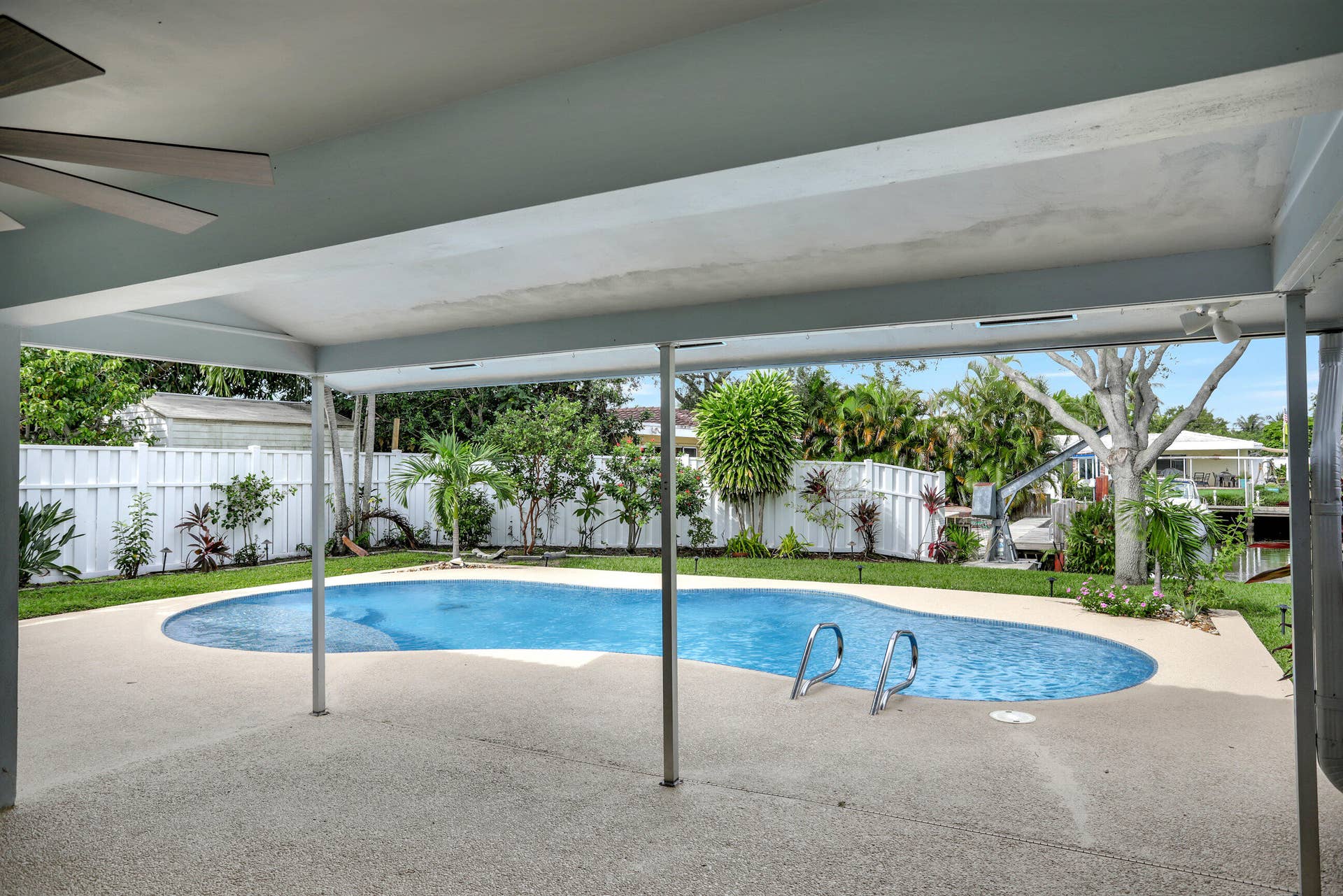 421 SE 5 Terrace, Pompano Beach, FL 33060 Covered patio looking at the pool , deck and water.