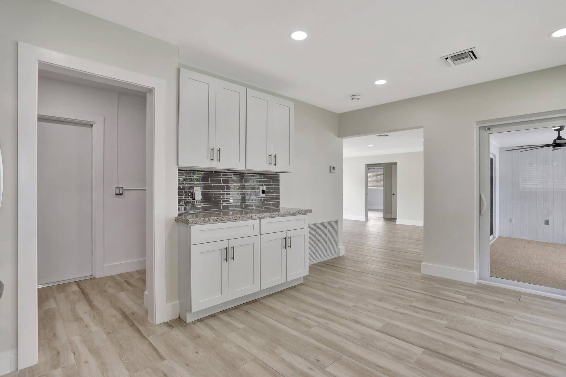 421 SE 5 Terrace, Pompano Beach, FL 33060 Extended part to kitchen. Door on left leads to laundry & utility room and garage.