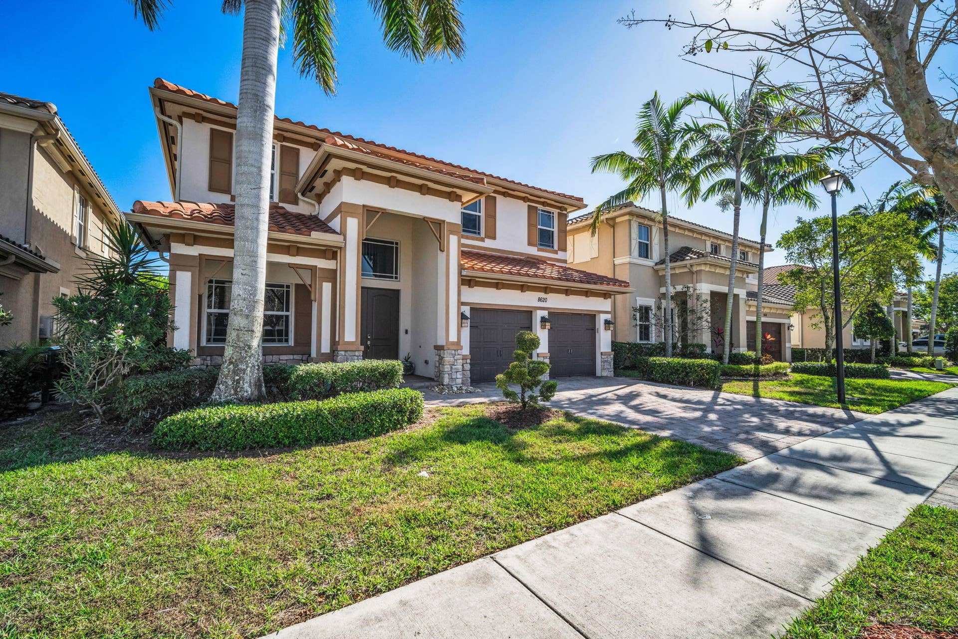 8620 Waterside Court, Parkland, FL 33076 Front Exterior - Corner Angle