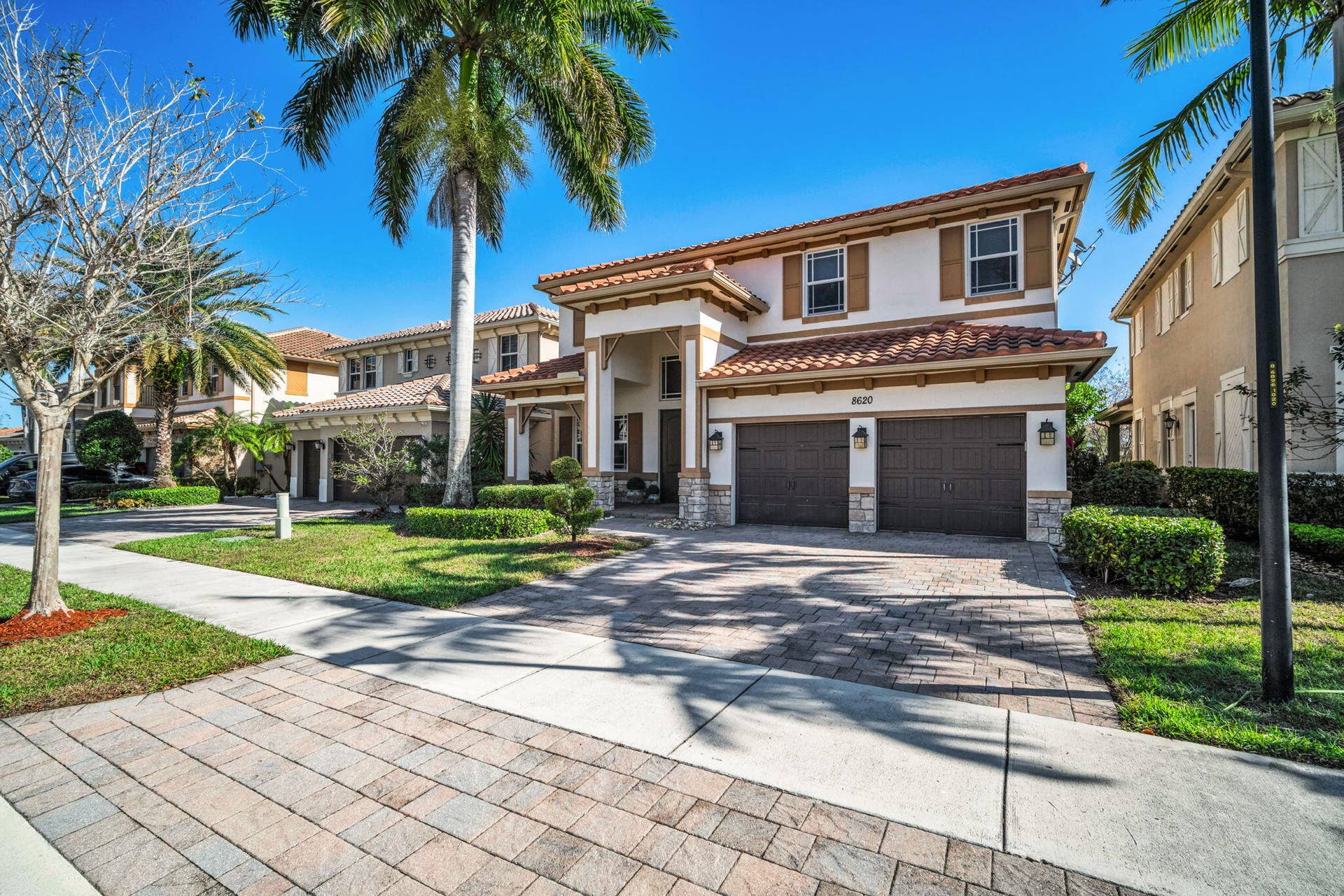8620 Waterside Court, Parkland, FL 33076 Front Exterior - Driveway View